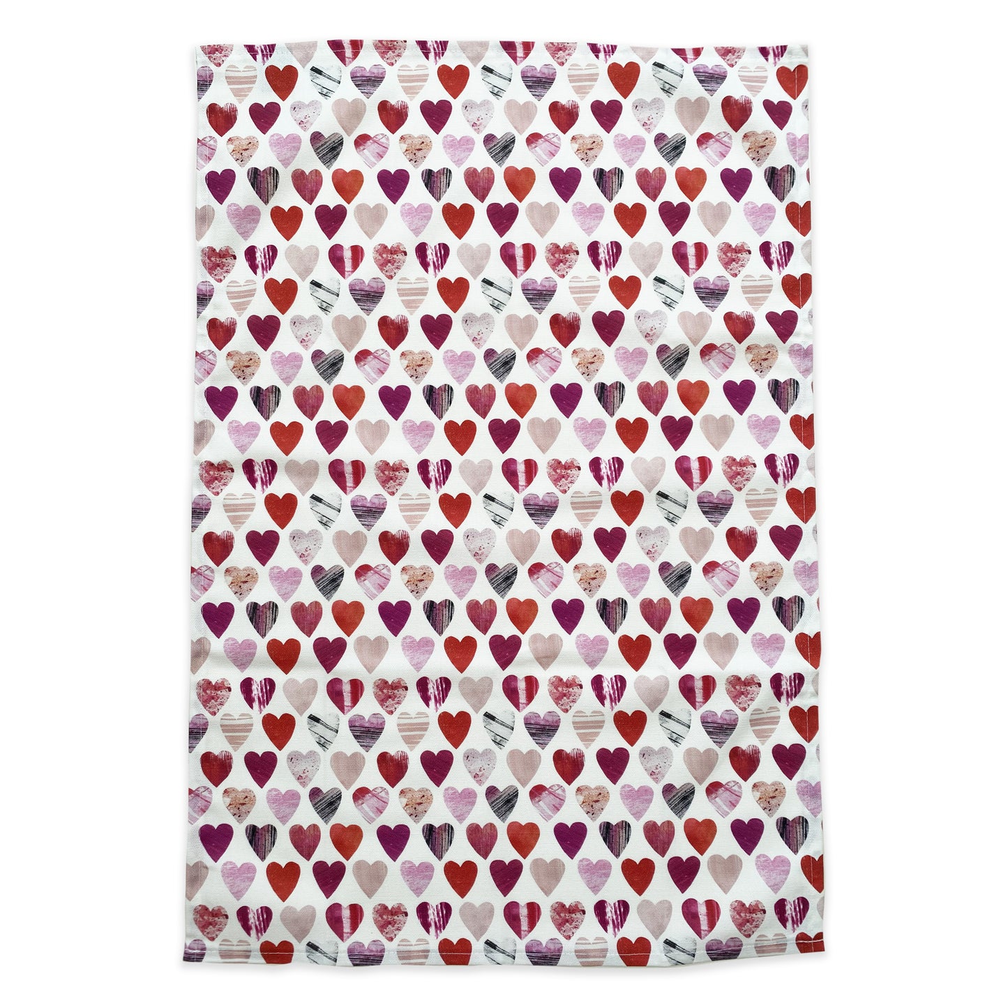 An opened out heart tea towel on a white background.