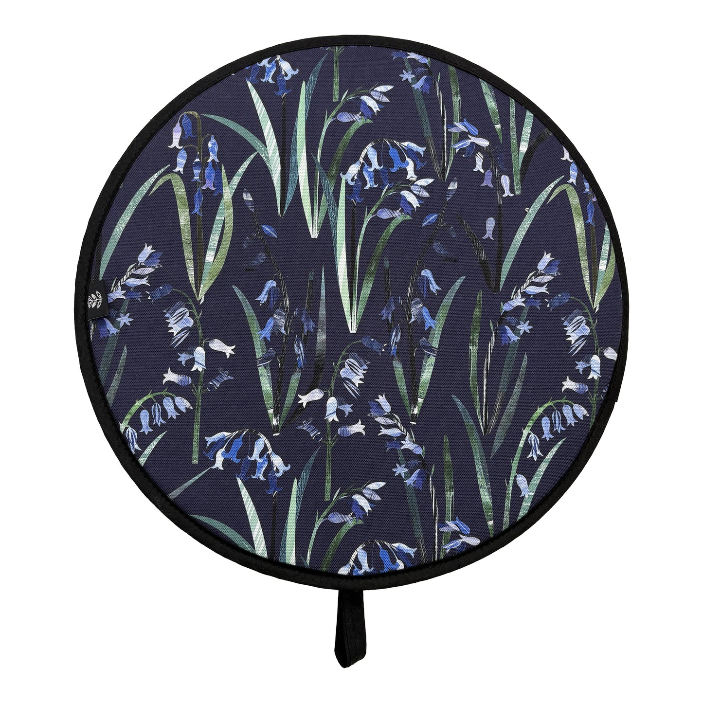 A bluebell Aga topper has been placed onto a plain white background.  You can see the Brand label sewn into the black binding of the hob cover.