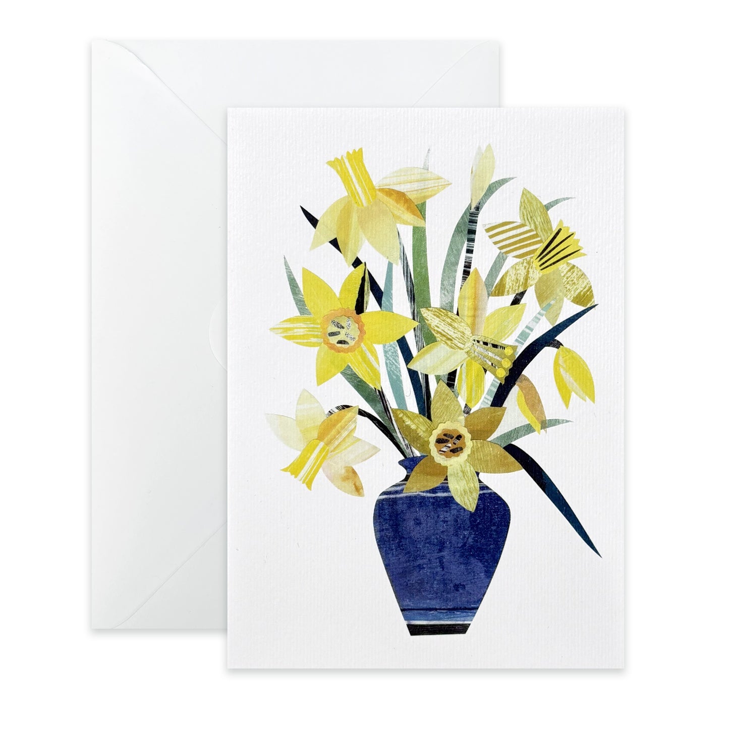 Greeting card with yellow Daffodil flowers in a blue vase on a white background, with a white envelope.