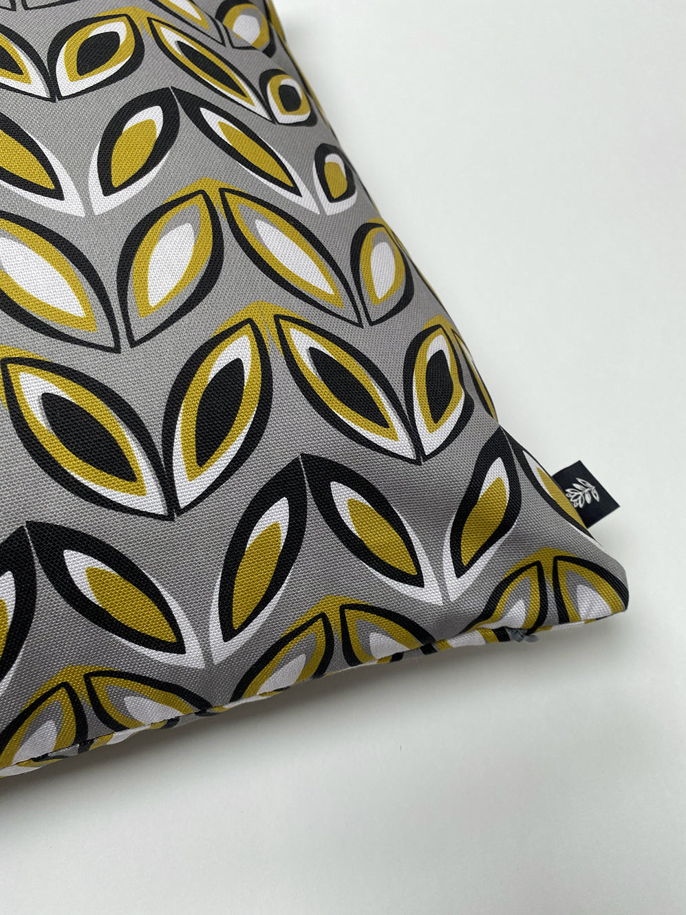 GREY AND YELLOW GEO LEAF CUSHION | END OF LINE
