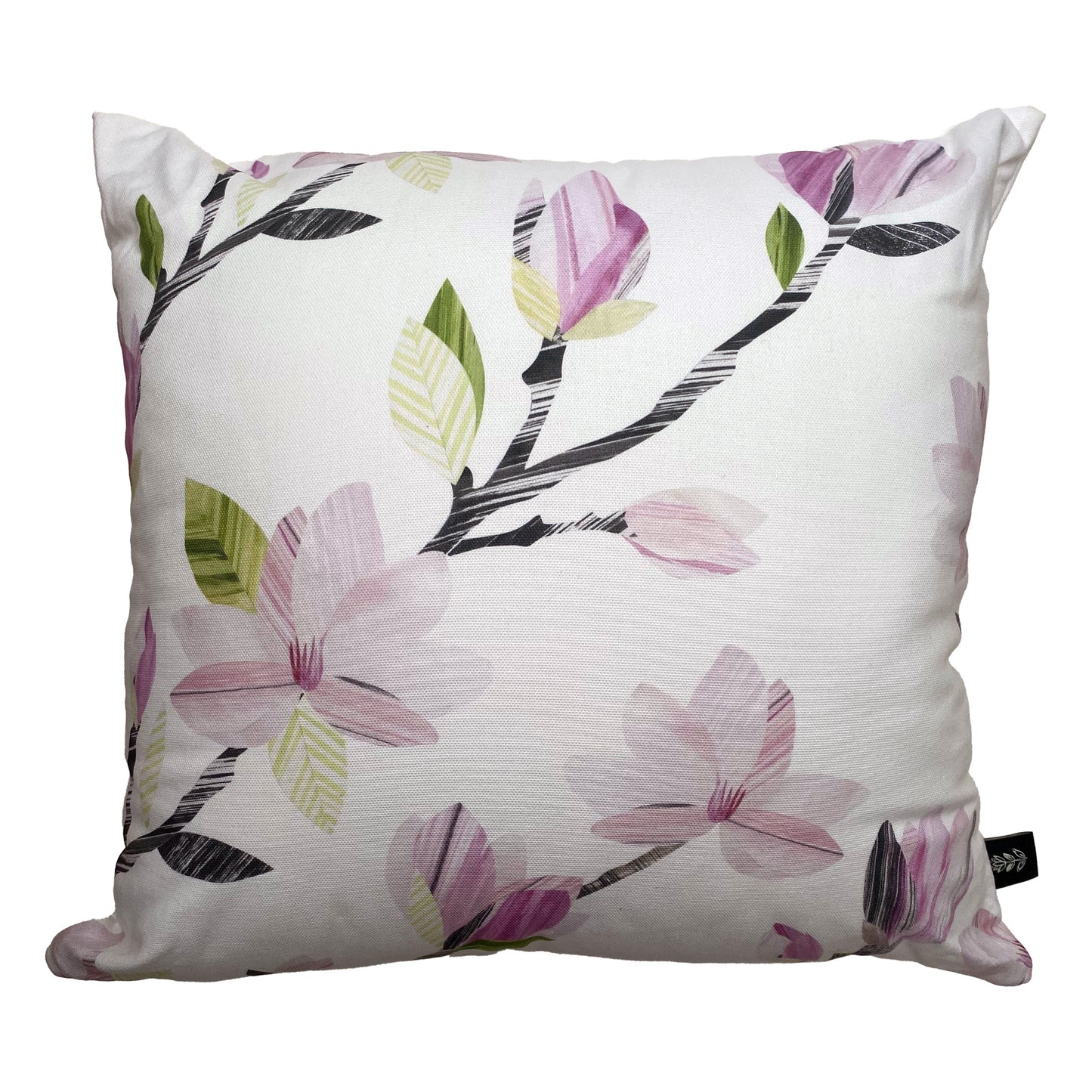 A Square Magnolia Cushion, features soft pink Magnolia flowers with grey and green leaves on a white background. The cushion is laid onto a plain white background.