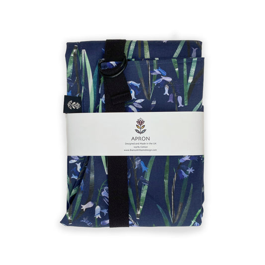 A packaged Navy Bluebell Apron on a plain white background.