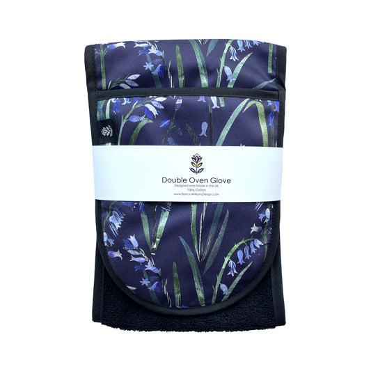 Bluebell Oven Gloves have been packaged in a branded belly band and placed on a plain white background.