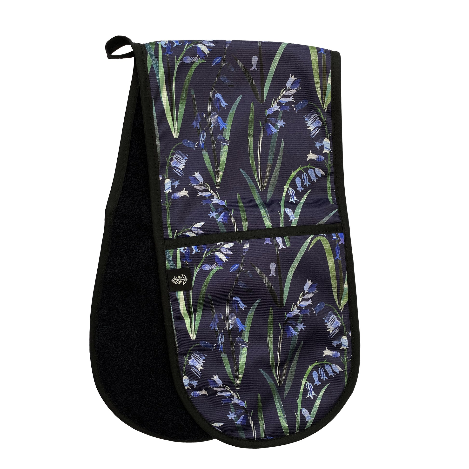 Navy Bluebell Oven Gloves placed at an angle on a plain white background so that the black towelling can be seen.