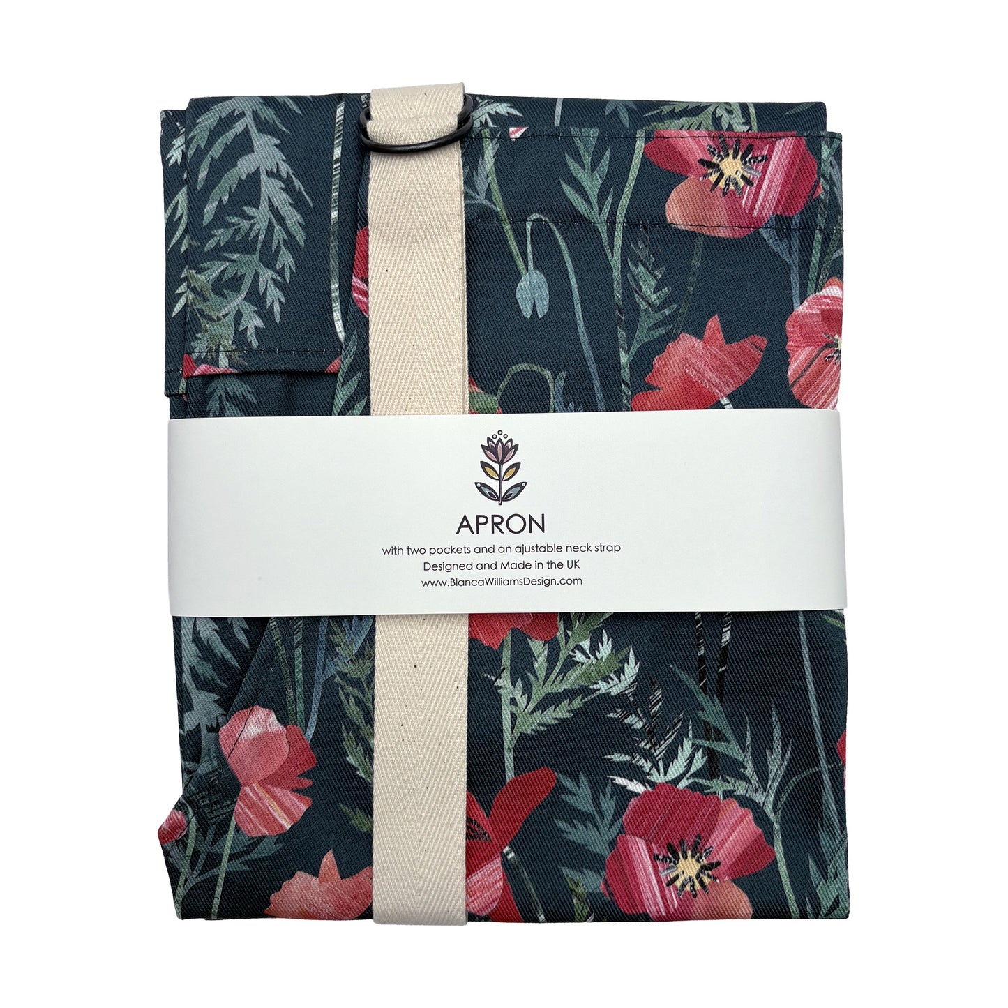 A packaged poppy apron with ecru straps has been packaged in a Bianca Williams Design Packaging and placed on a plain white background.