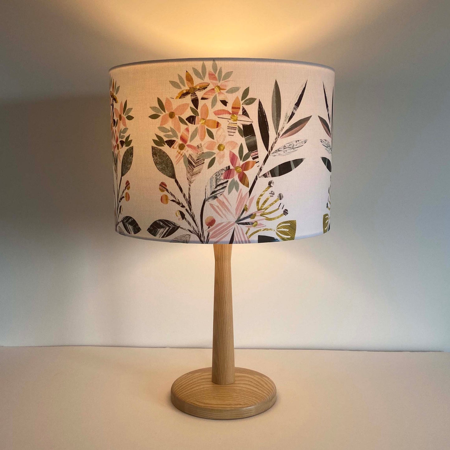 Pink and Peach Floral Medium lampshade, with the light on, 30cm diameter.