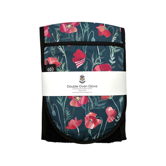 Poppy Double Oven Gloves have been packaged in a branded belly band and placed on a plain white background.