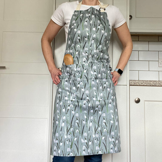 Snowdrops Apron with two double front pockets and adjustable neck strap.  Ecru Cotton Ties and trims.
