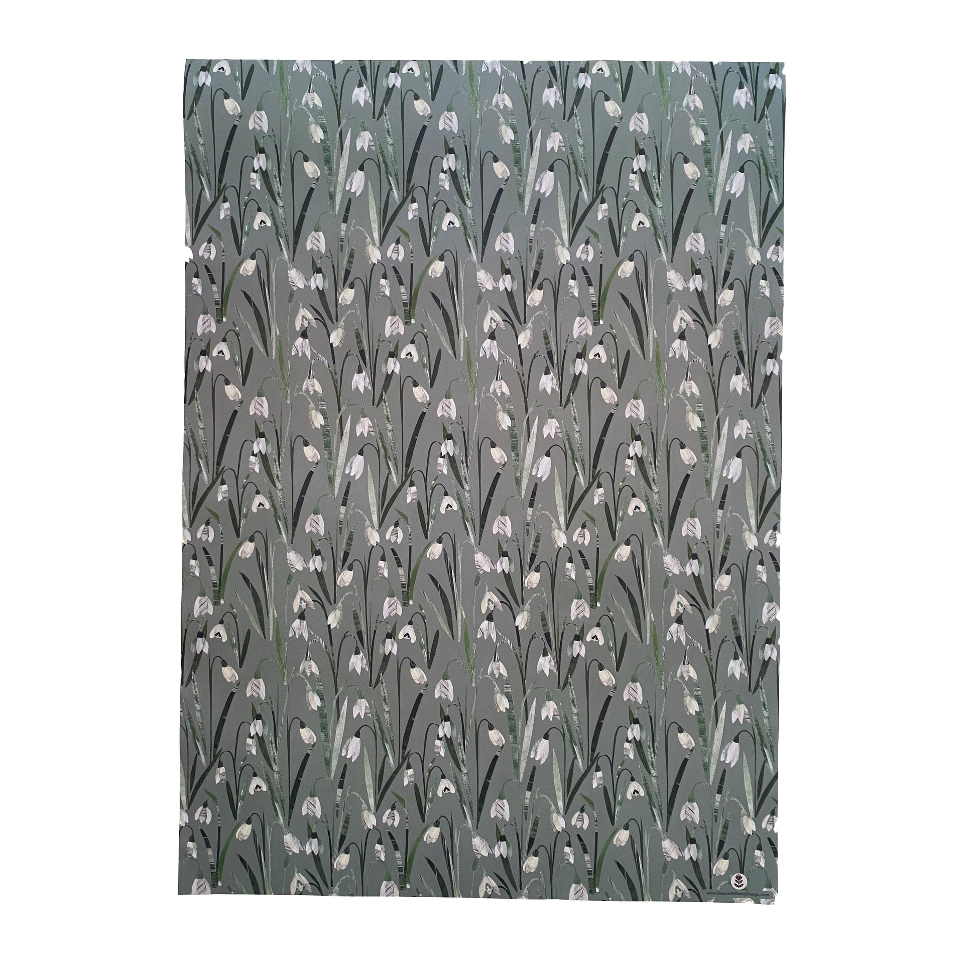 Sheet of Snowdrop Gift Wrap placed on a white background.