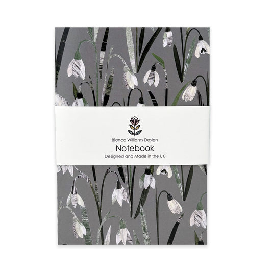 A Snowdrops Notebook has been placed on a white background.
