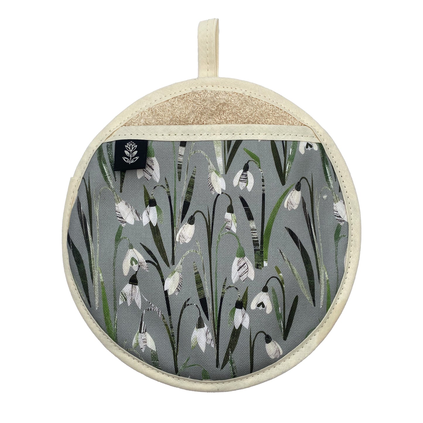 Snowdrops Pot Holder featuring the pretty little cream and white flowers on a sage green background.  The pot grab has a cream hanging loop and a brand label sewn onto hand opening.  It has been placed a white background.