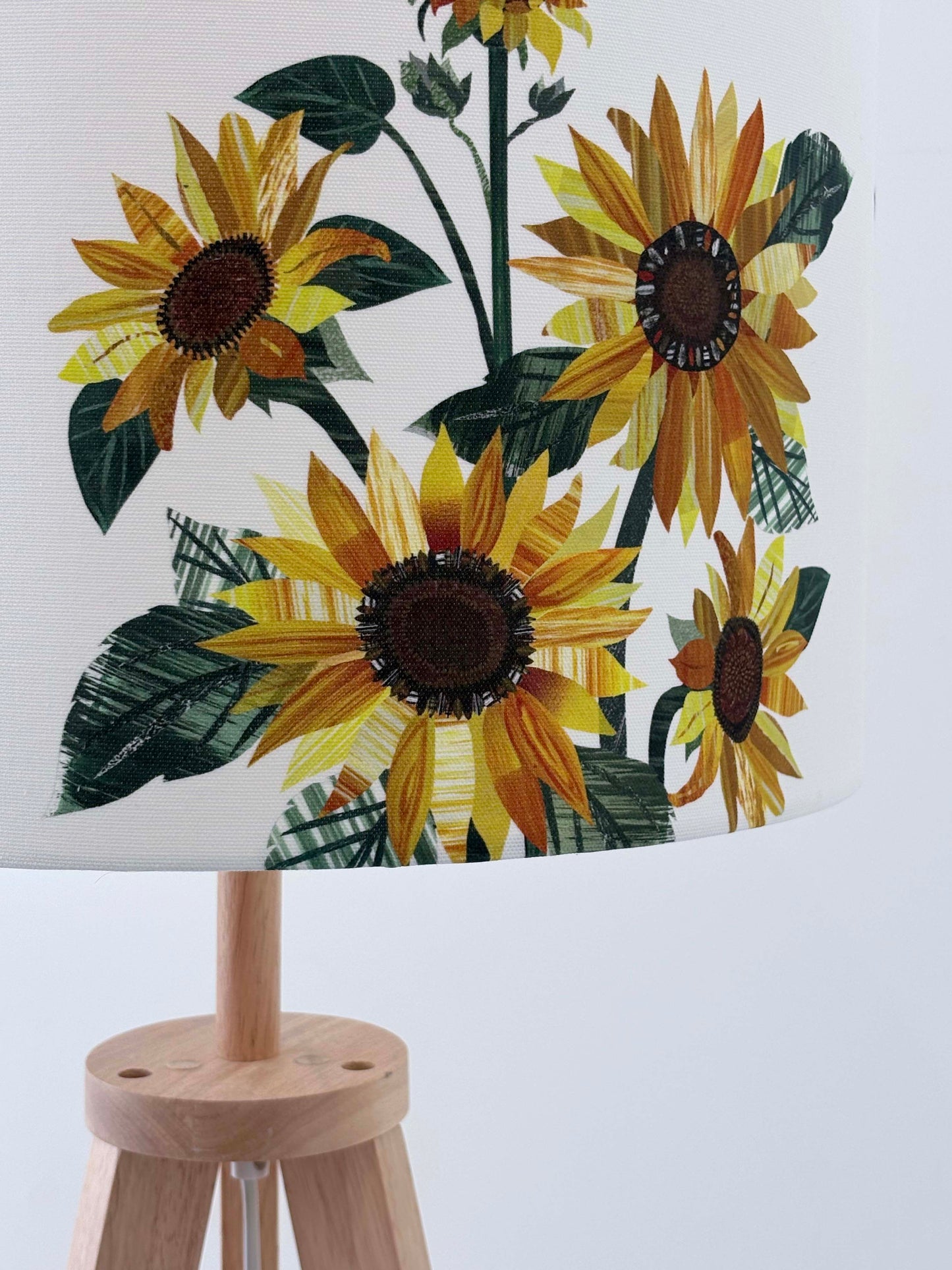 A close up of the Sunflower design on a large lampshade.
