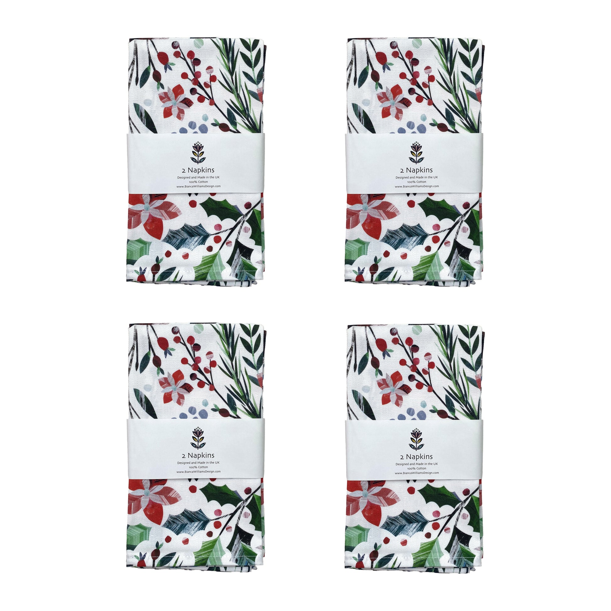 Winter Floral Napkins featuring red Poinsettia flowers and green holly with pine cones has been packaged in a branded belly band with eight Matching Napkins.