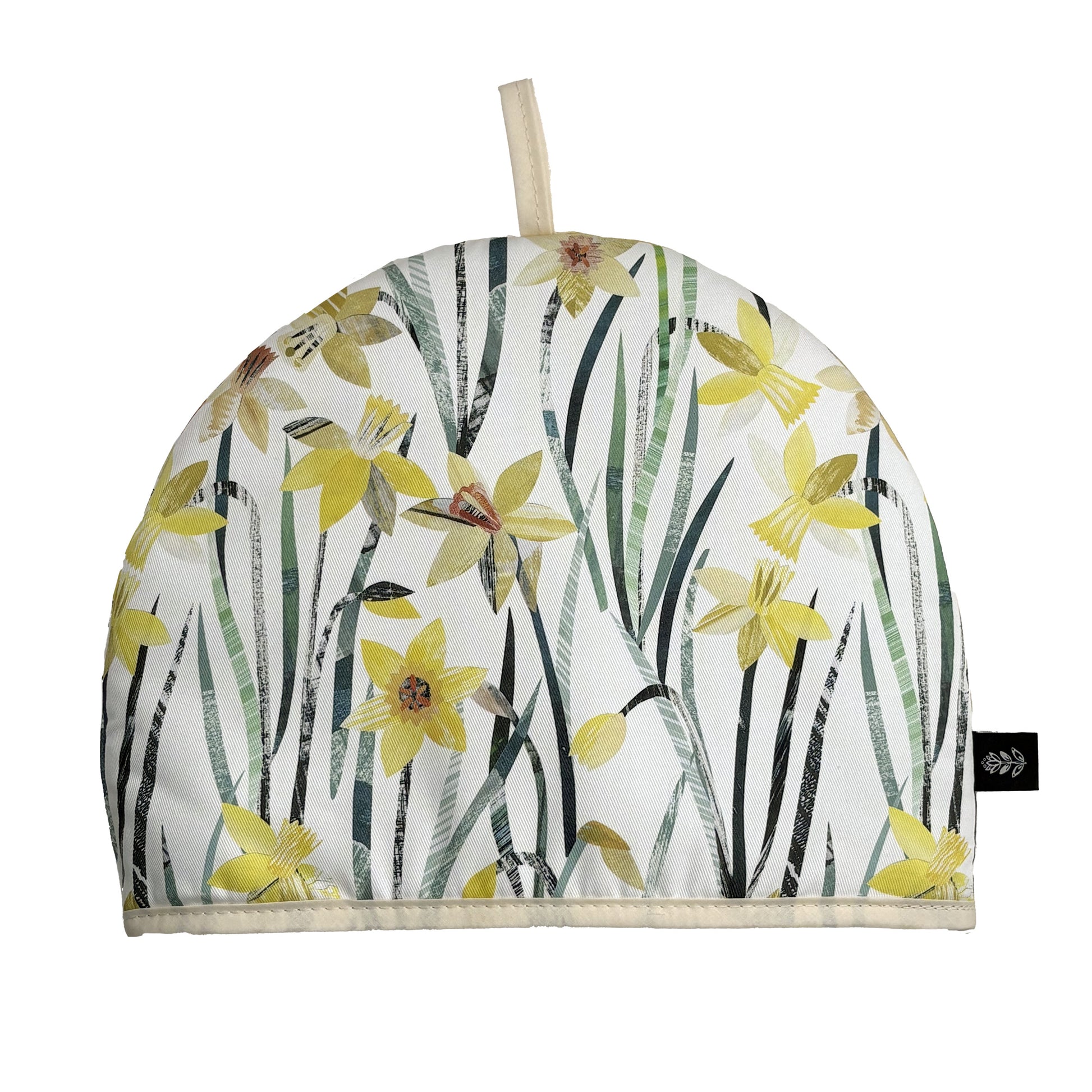 Tea cozy with a yellow daffodil floral design on a white background.