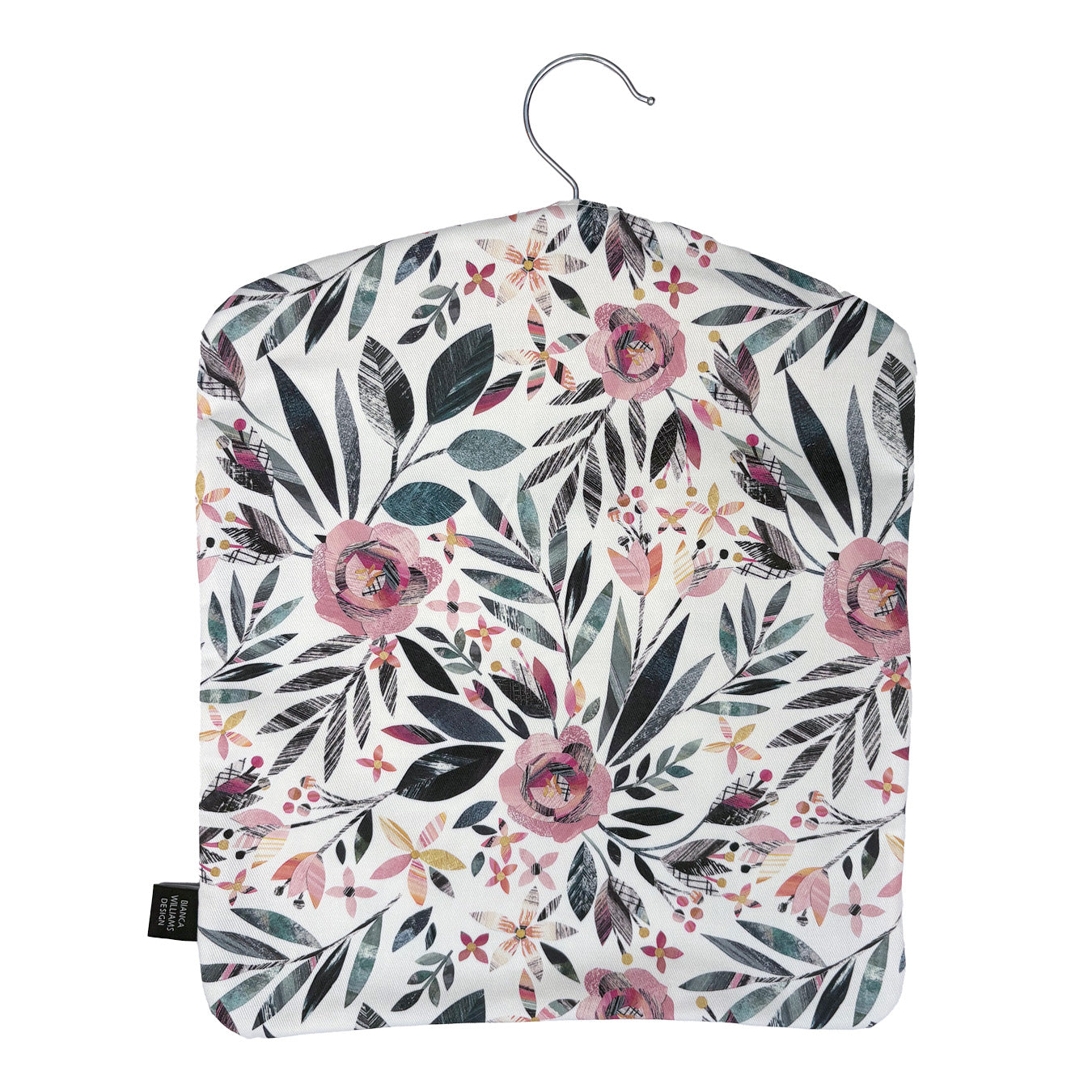 A Summer Floral peg bag has been placed on a white background.  You can see the metal hook coming out of the top and a black brand label has been sewn into the outside seam.