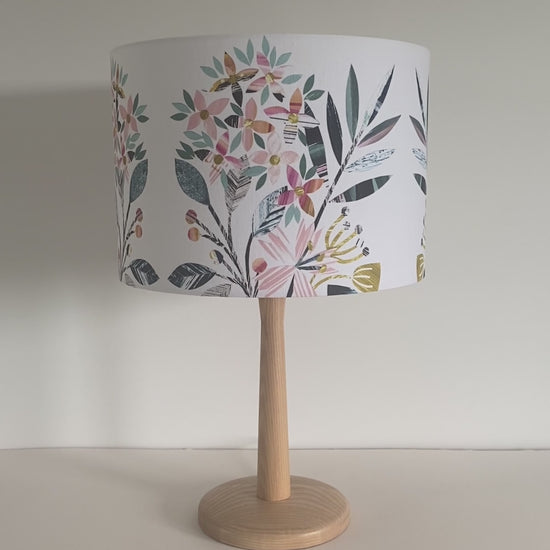 Video showing the 30cm Pink and Peach Floral lampshade with its light off and then light turned on.