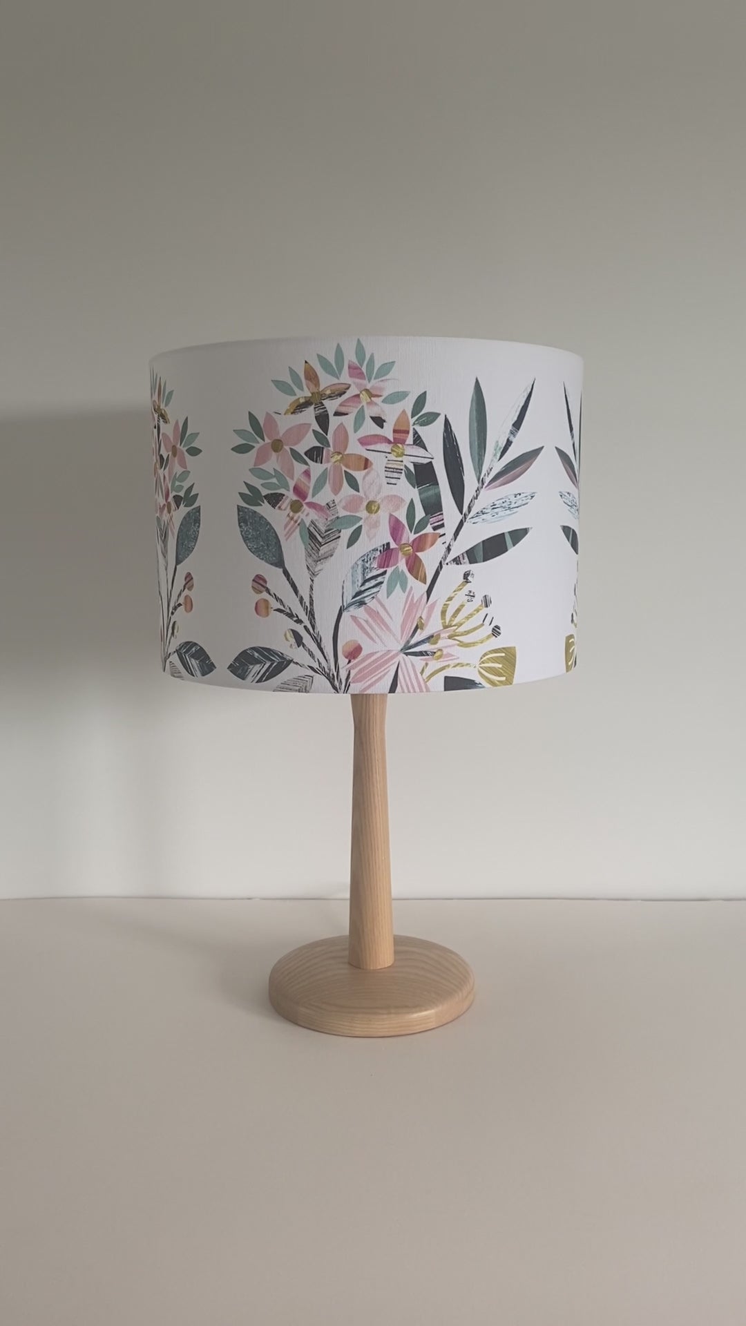 Video showing the 30cm Pink and Peach Floral lampshade with its light off and then light turned on.